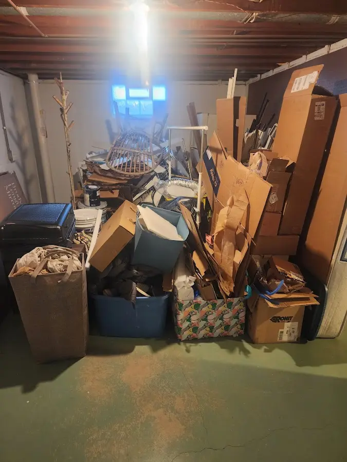 Roll-off dumpster container at job site for Concrete Dumpster Rental in Queensbury